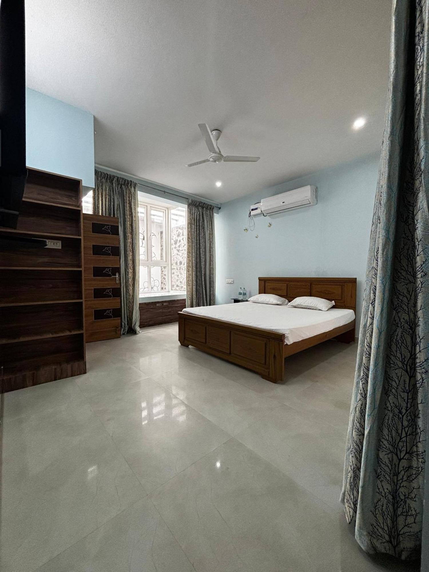 Ezhilagam Stays Madrás Habitación foto